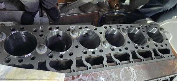 Marine diesel engine block overhaul with exposed cylinder bores
