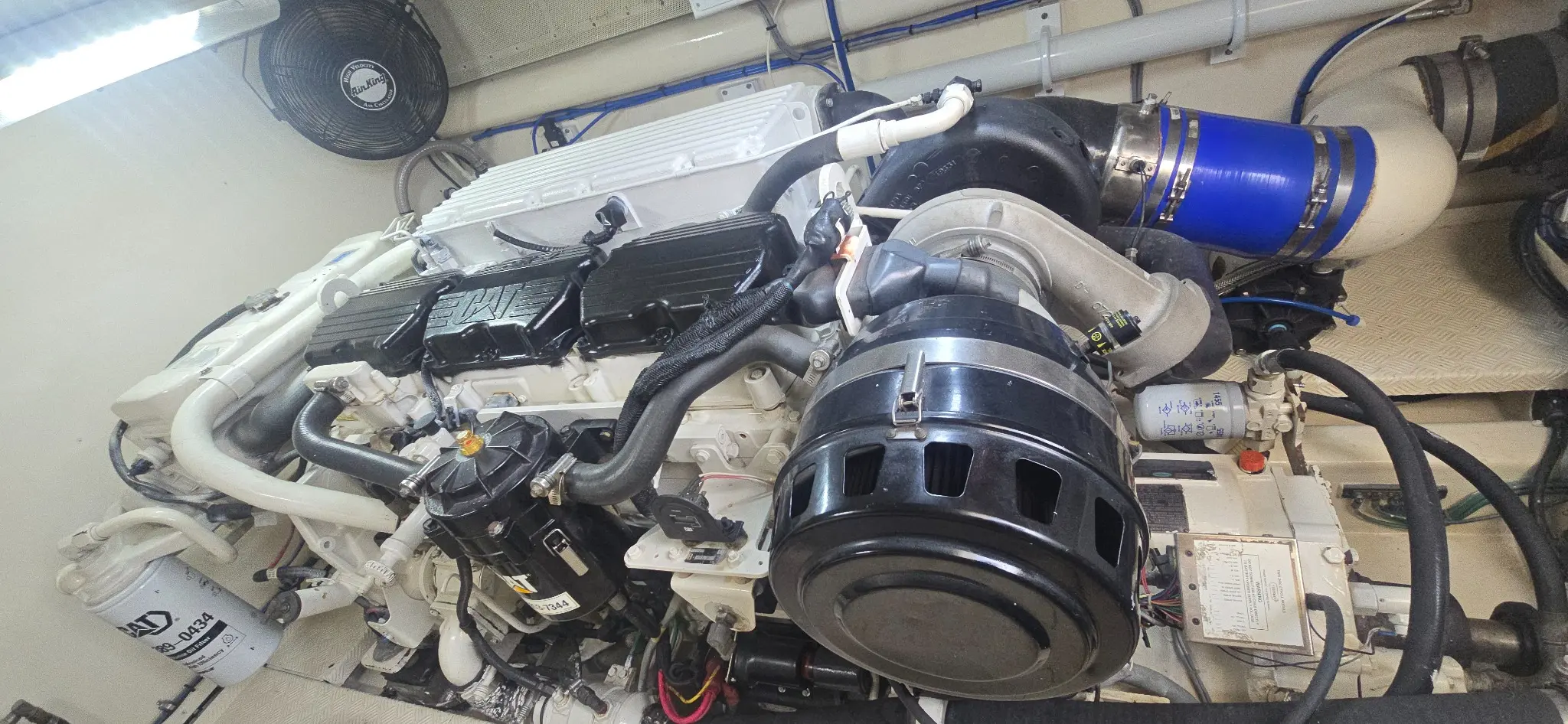 Marine diesel engine and turbocharger installation inside a yacht engine room